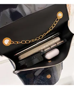 A detailed view of the holographic small square bag interior showing ample storage capacity
