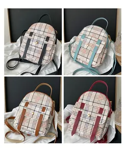 Four stylish plaid mini backpacks in various colors displayed in a professional grid layout.