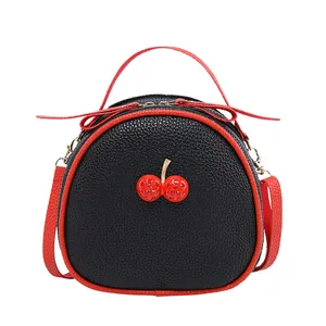Stylish black and red cherry-themed crossbody bag with lychee grain texture