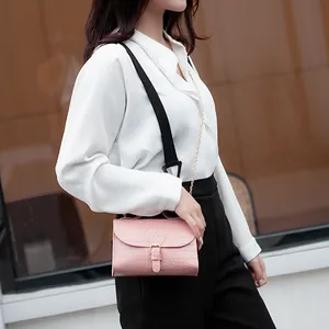 Elegant pink stone pattern crossbody bag for women with chain strap and buckle detail