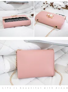 Multi-view of pink chain shoulder bag with pearl clasp and glitter detail