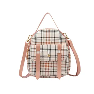 Fashionable plaid mini backpack for women, stylish crossbody bag with pink straps