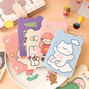 Cuadernos creativos con formas de dibujos animados y portadas ilustradas para artículos escolares