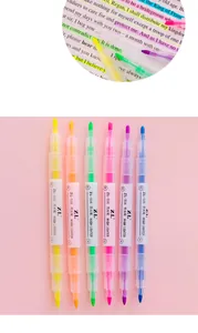 Close-up detail of double-ended colorful highlighters showing tip and vibrant ink effect