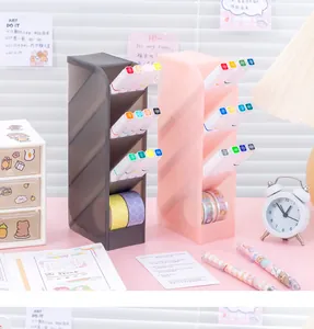 Detail of diagonal desk organizer filled with colorful markers and tapes