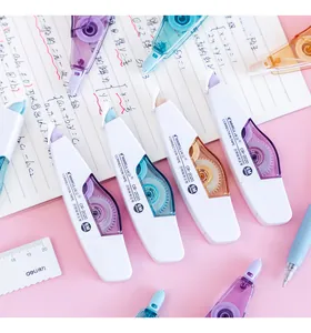 Set of Morandi color correction tapes with transparent shells on a notebook