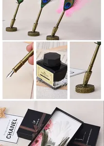 Close-up of vintage feather dipping pen set details with black ink and elegant gift box packaging