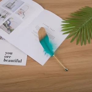 Creative teal feather gel pen with gold tip, elegant stationery for writing and gifts