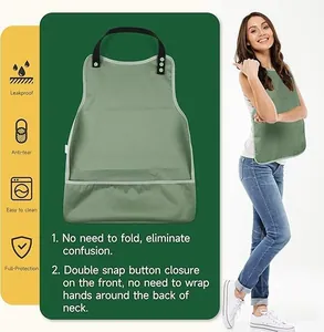 Detailed view of waterproof adult bib with front snap closure and crumb catcher.
