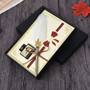 Vintage European white feather quill pen and black ink set in a classic gift box