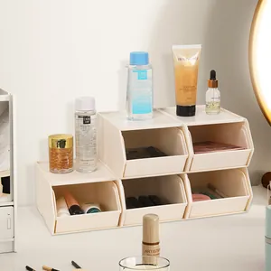 Modulaire crèmekleurige stapelbare opbergdozen voor make-up en bureauaccessoires