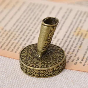 Vintage European style carved brass pen holder with intricate floral patterns
