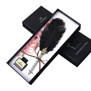 Elegantes Set mit natürlichem Straußenfeder-Schreibstift und Tinte in einer Luxusbox