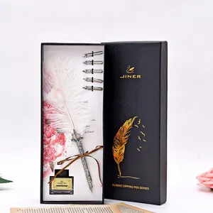 Luxury white feather dipping pen gift set including black ink and five metallic nibs