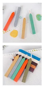 Detail showing vintage pearlescent sealing wax sticks in various colors for DIY crafts.