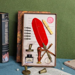 Luxuriöses Vintage-Kalligraphie-Set mit roter Feder, Tinte und Siegellack-Stempel.