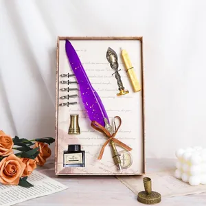 Complete vintage purple quill pen gift set including calligraphy ink and wax seal stamp