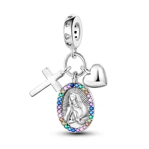 Religious silver charm with cross, heart, and colorful Virgin Mary medallion pendant