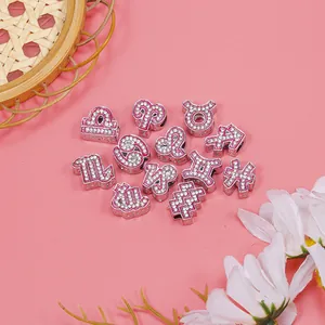 Zwölfteiliges Set aus rosa Sternzeichen-Anhängern mit Strasssteinen für DIY-Schmuckherstellung