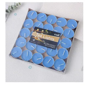 Top-down view of 25-pack blue tea light candles in clear plastic packaging.