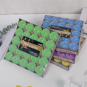 Set of multicolored round tea light candles in bulk packs for wedding and home decor