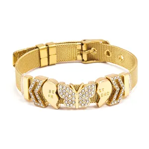 Gold mesh bracelet with butterfly and Best Friend heart charms and pavé crystals