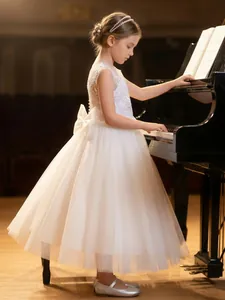 Elegante vestido de princesa de encaje y tul blanco para niña con lazo grande