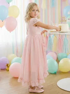 Detailed view of the pink lace bodice and high-low chiffon skirt for girls' evening wear