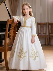 Elegant white girls' ethnic gown with intricate gold leaf embroidery and crown.