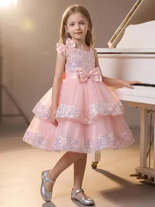 Elegant pink sequined flower girl dress with layered mesh skirt and bow detail