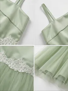 Detailed views of an elegant sage green flower girl dress showing satin and lace texture