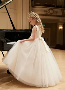 Detail view of the elegant lace bodice and layered tulle skirt on a girls flower dress