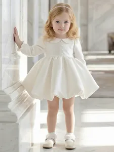 Elegant white flower girl princess dress with Peter Pan collar and puffed skirt on girl