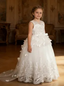 Elegant white lace flower girl dress with 3D butterfly appliqués and a long flowing train