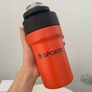 Close-up of a hand holding a large orange insulated stainless steel sports water bottle