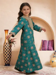Full-length view of a girl's teal maxi dress featuring a gold lace collar and floral print