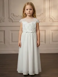 Detailed full view of white lace and chiffon flower girl dress for weddings and parties