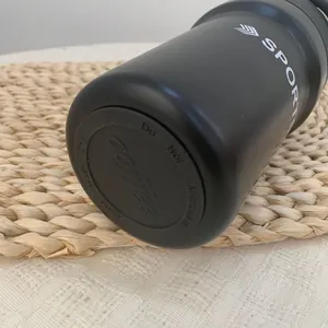 Close-up detail of the bottom of a matte black 304 stainless steel insulated water bottle