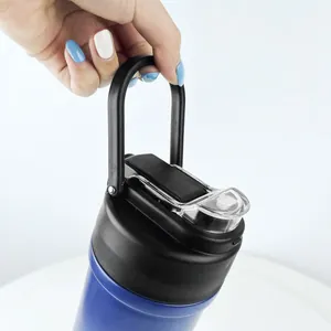 Portable 316 stainless steel insulated coffee mug with handle shown being held by hand