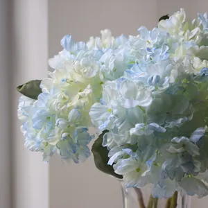 Close-up of vintage French artificial hydrangea with delicate scorched edge detail