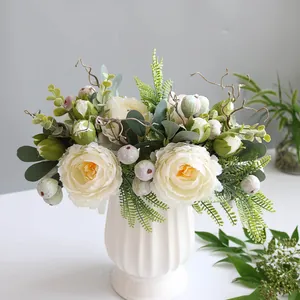 Detailed view of realistic white peonies and green leaves in a ribbed ceramic vase