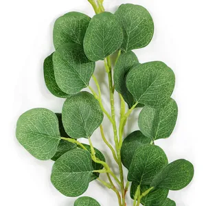 Close-up detail of artificial eucalyptus leaves with realistic green texture for decor