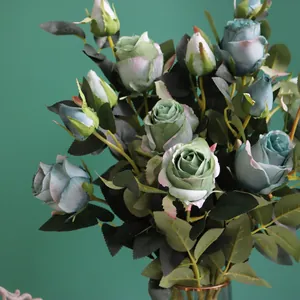 Vue détaillée de roses vertes artificielles style peinture à l'huile avec feuilles de soie