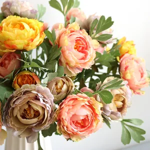 Close-up detail of vibrant silk artificial peony flowers for home and wedding decor