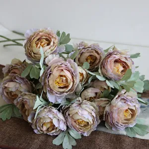 Detailed macro view of vintage silk peony artificial flowers for home wedding decor