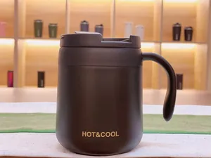 Detailed view of matte black 304 stainless steel insulated coffee mug with a sturdy handle.