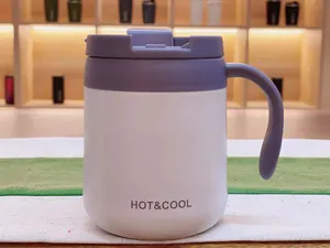 Detail of cream white 304 stainless steel thermal mug with purple handle and lid
