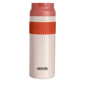 Elegant cream 316 stainless steel sports thermos bottle with red bounce lid and textured grip