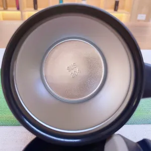 Interior view of 304 stainless steel insulated mug showing food-grade material stamp
