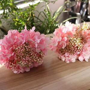 Detailed view of pink silk hydrangea flowers for home decor and floral arrangements.